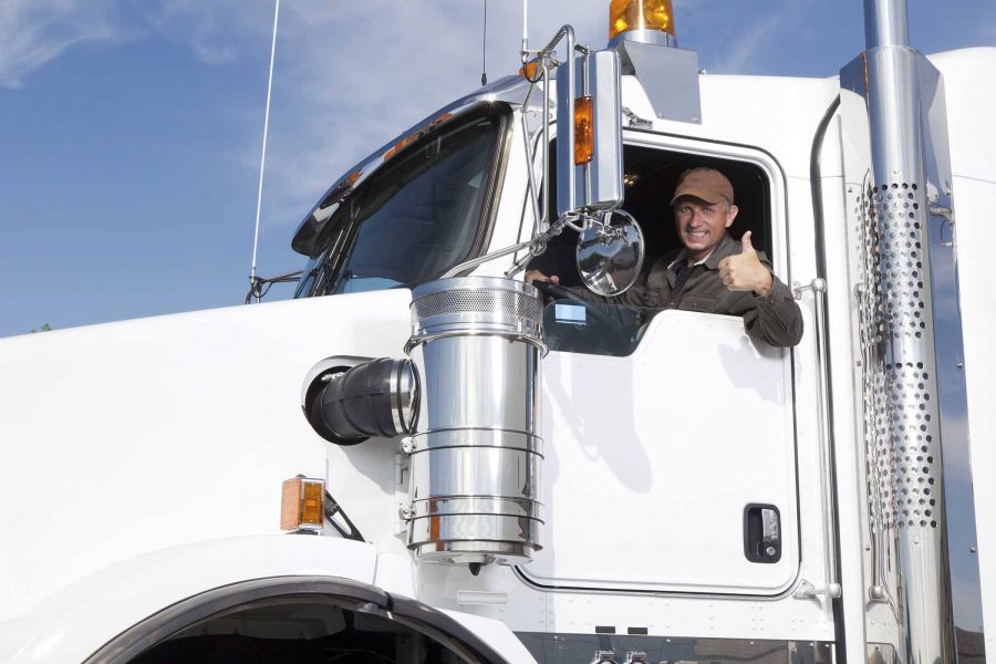 man giving the thumbs up from a truck repaired by Triple LLL Truck Repair