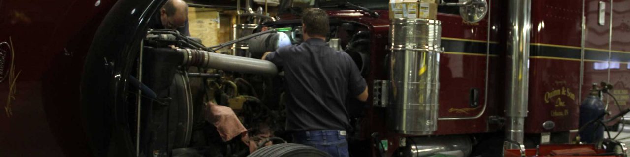 Triple LLL Truck Repair performing maintenance on a semi truck